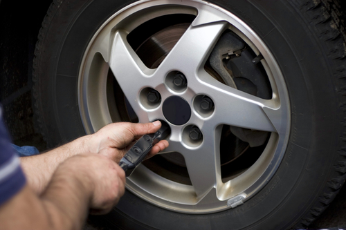 Torqueing The Lug Nuts By Ada Hasloecher